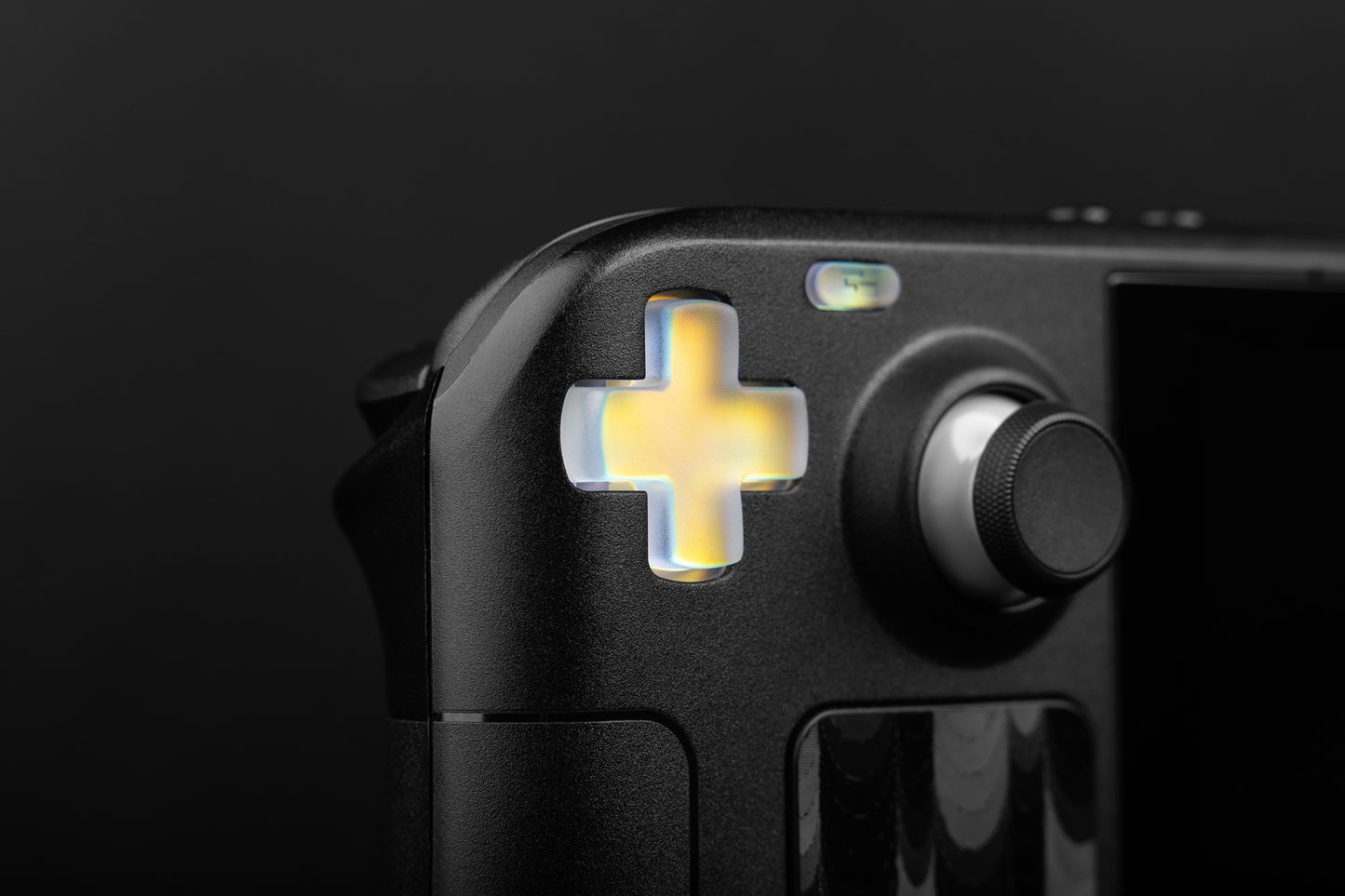 Close up of holographic dpad installed on steam deck.