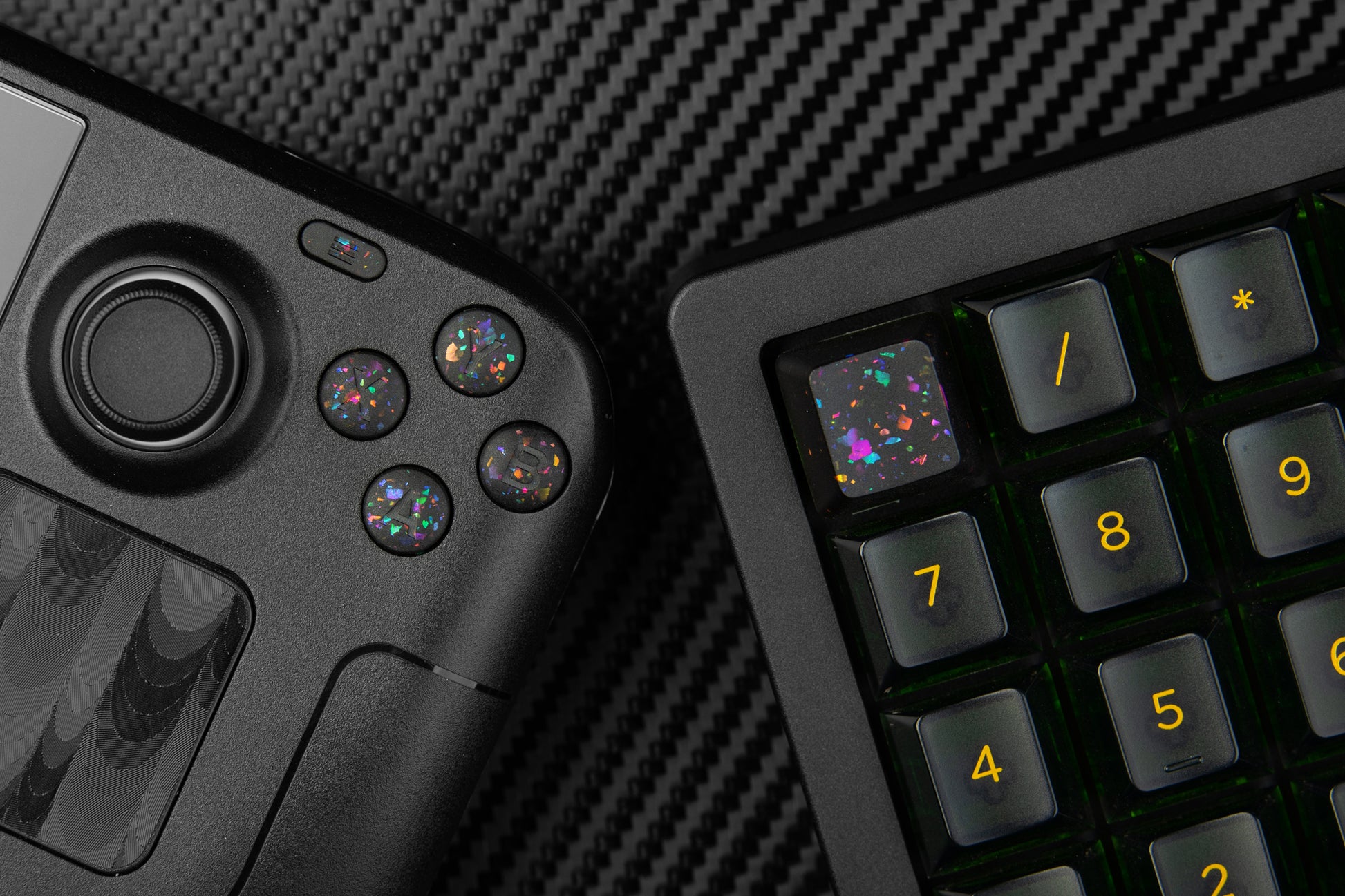 Steam deck with party black ABXY buttons showing next to keyboard numpad with matching party black themed keycap