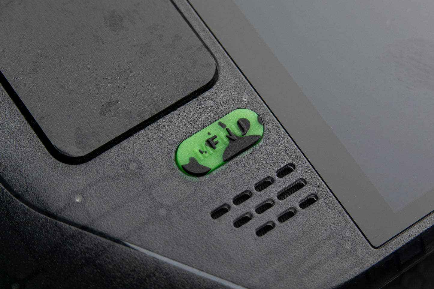 close up menu button black and green splat theme. Steam deck