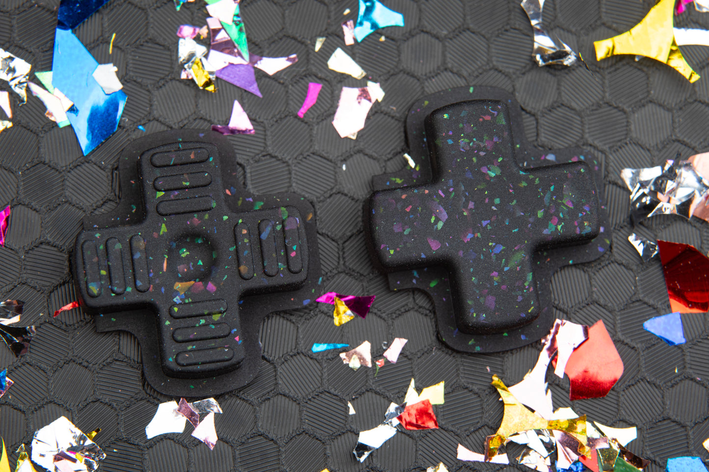 two party black dpads. left DMG gameboy style right standard.