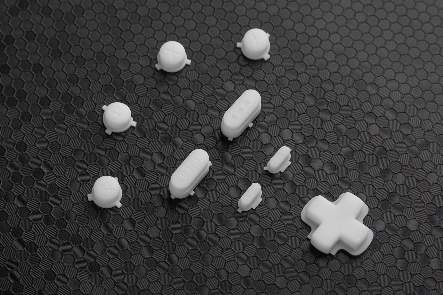 White sparkle flake steam deck buttons on a hex backgound