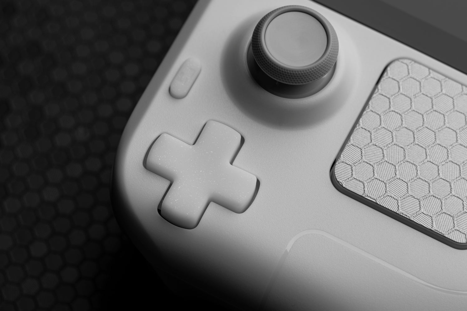 close up of white sparkle dpad on white steam deck a