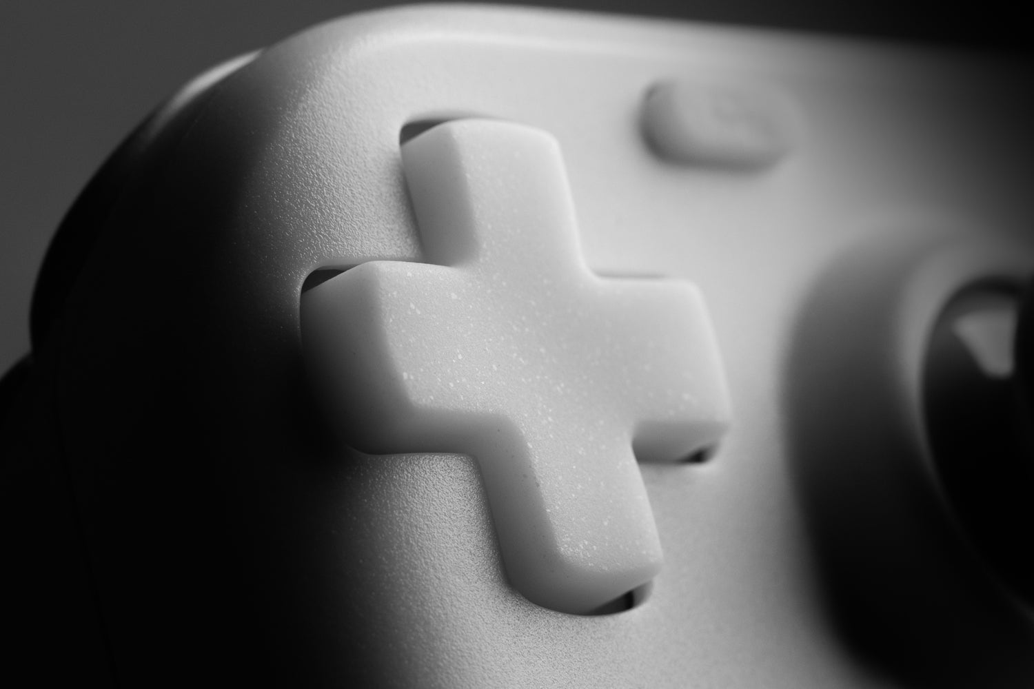 moody close up shot of arctic white steam deck dpad