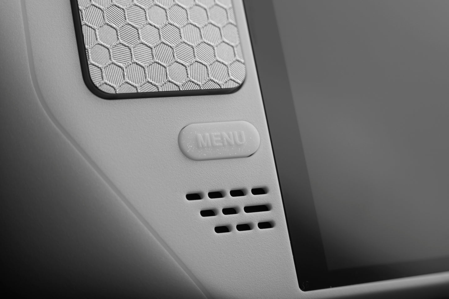 close up of menu button white sparkle steam deck button on white OLED steam deck