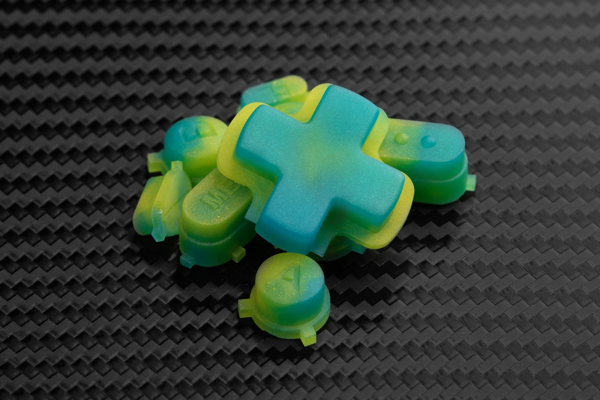 tropical themed steam deck buttons in a pile