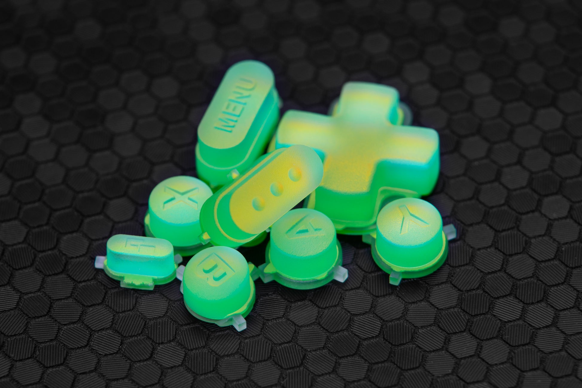 Pile of laser holo buttons (green yellow blue)