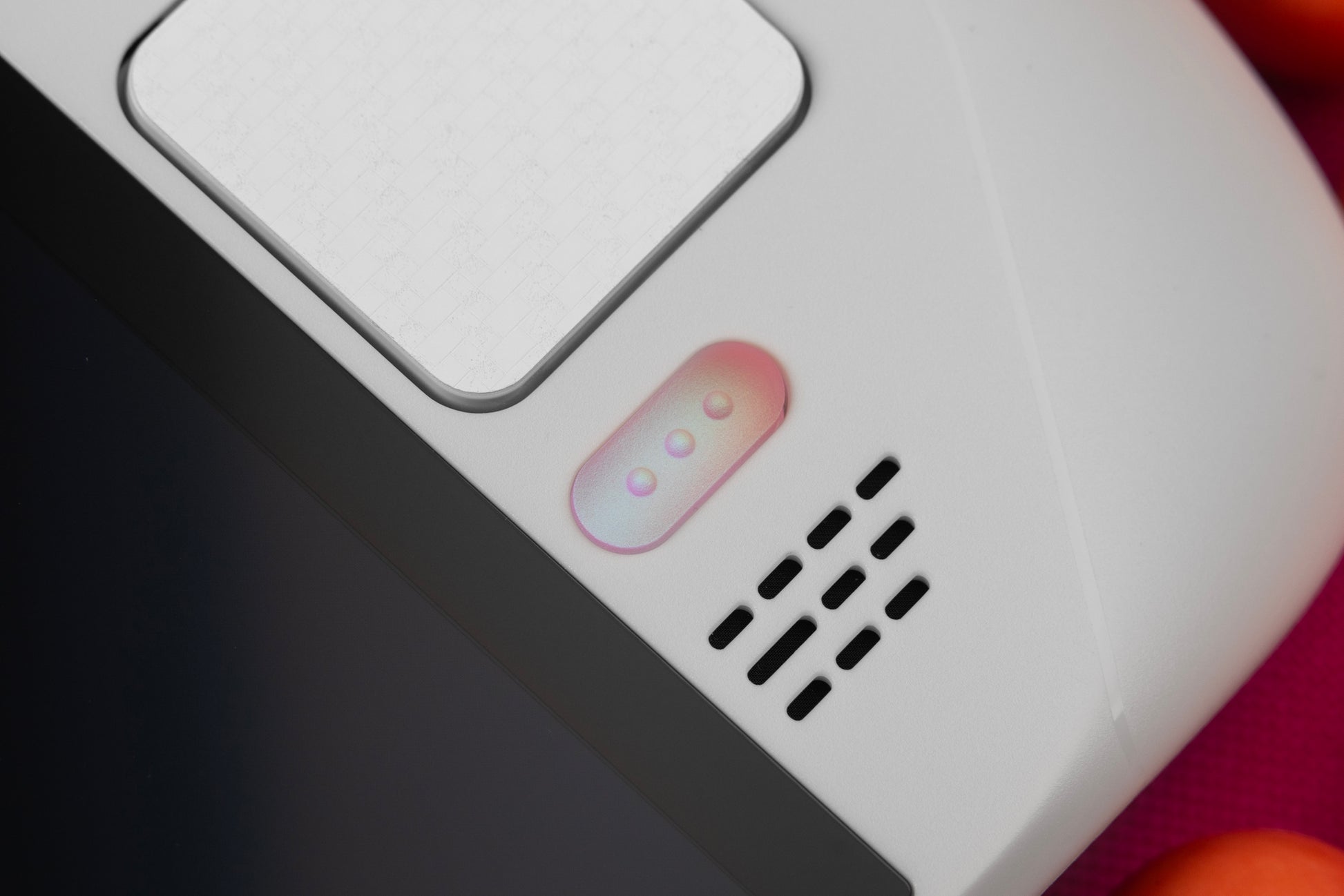hyper close up of quick access menu button in pink to blue to champagne color shift