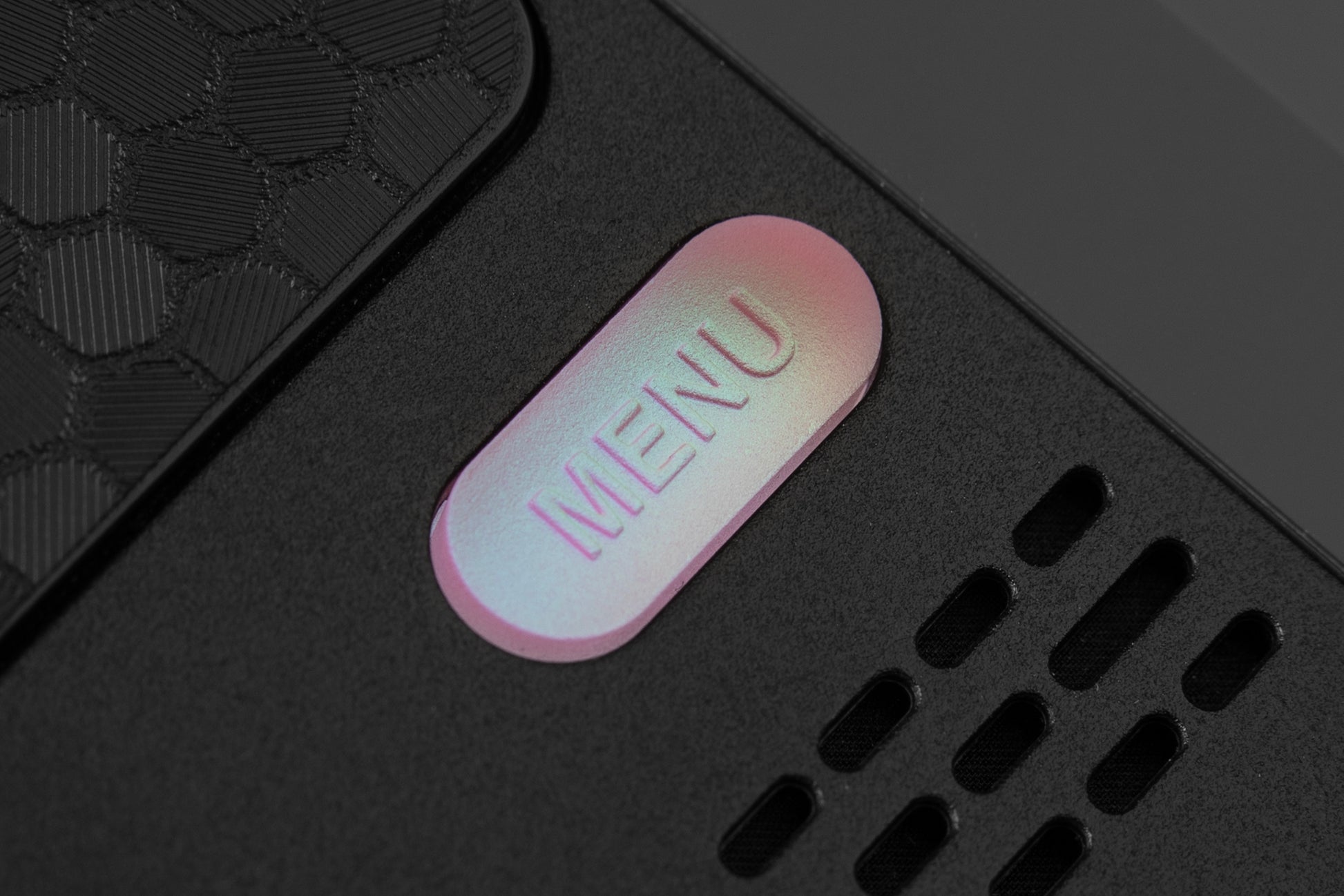 hyper close up of menu button with pink to blue to champagne color shift