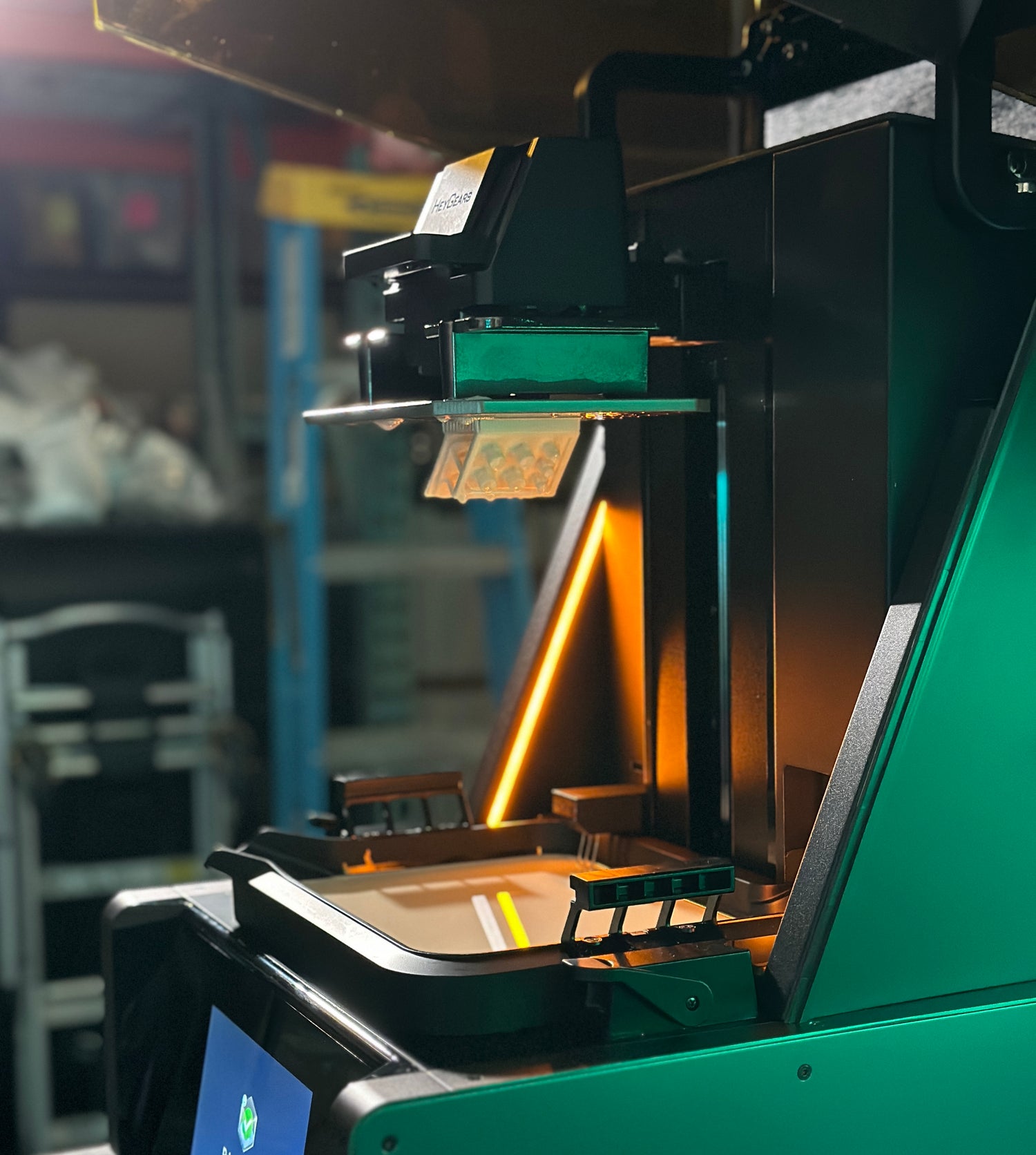 stylized image of resin 3d printer with a part printed