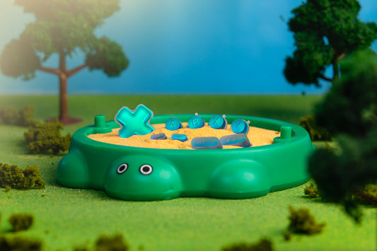 holographic blue steam deck buttons inside a miniature turtle shaped sandbox
