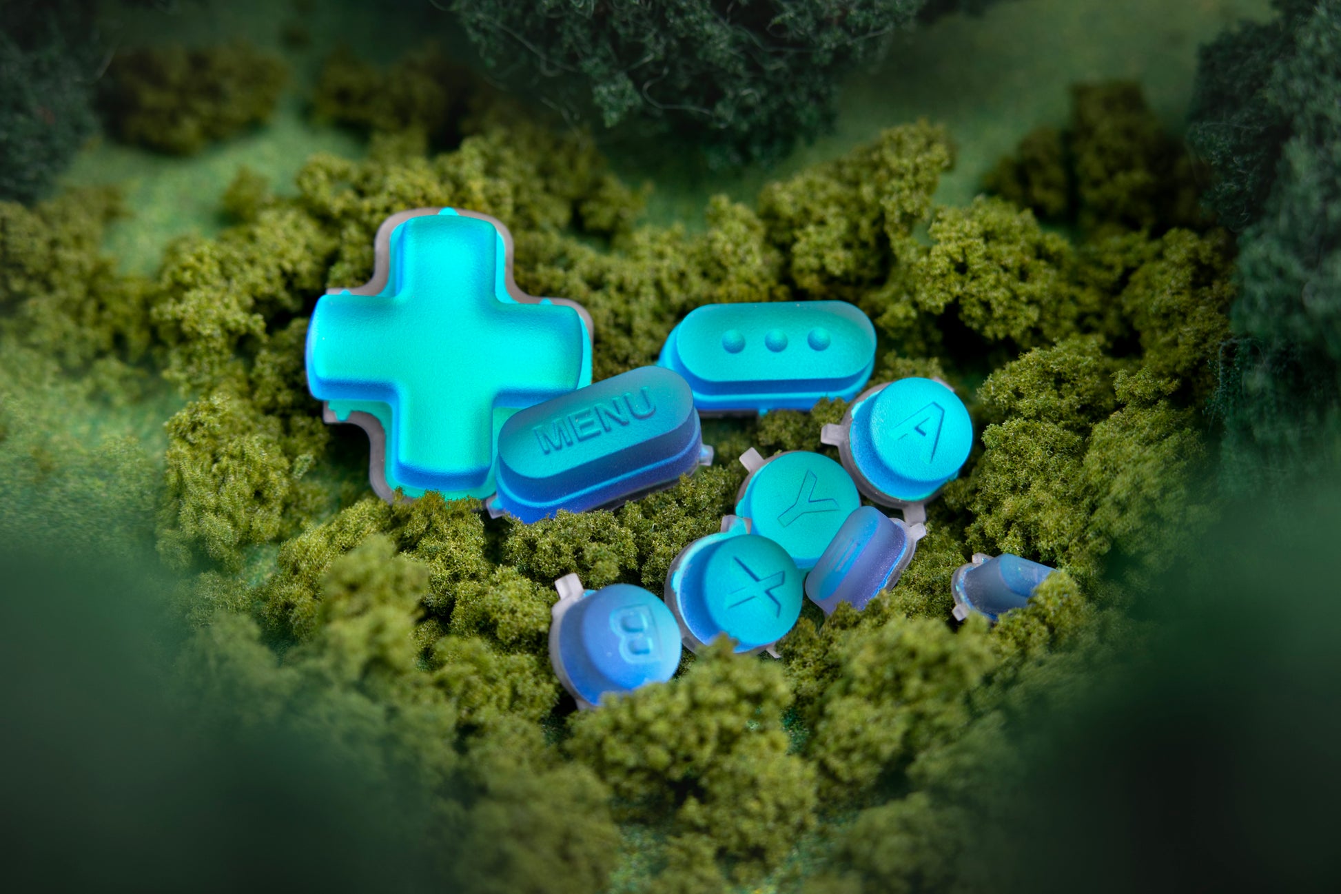 holographic blue steam deck button set in a mossy field