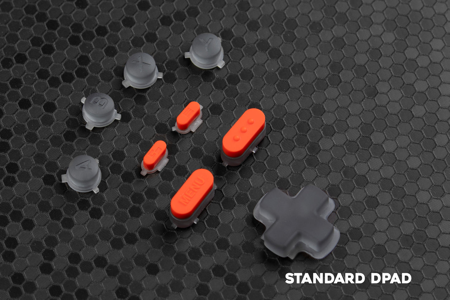 Transparent grey and orange accented button set for the limited edition oled steam deck. Standard grey dpad
