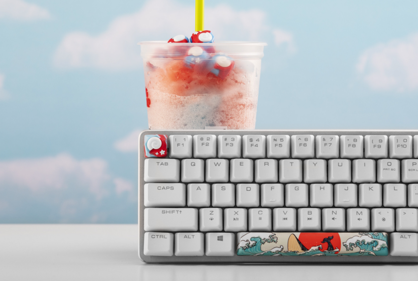 Animal crossing keyboard key installed on a keyboard with a slurpee behind it