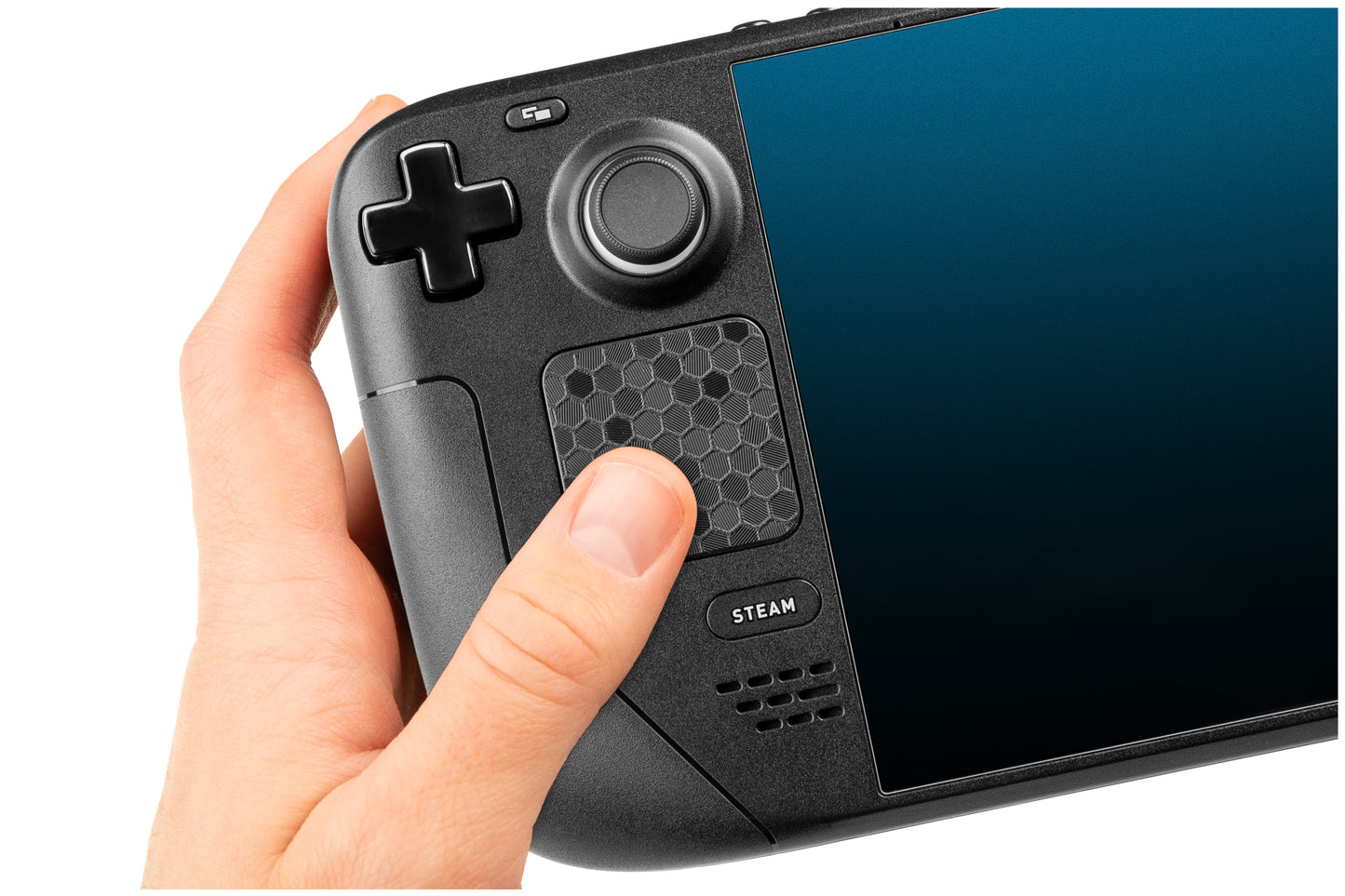 Steam deck in hand with black hex pattern touchprotect on trackpad. Thumb on trackpad.