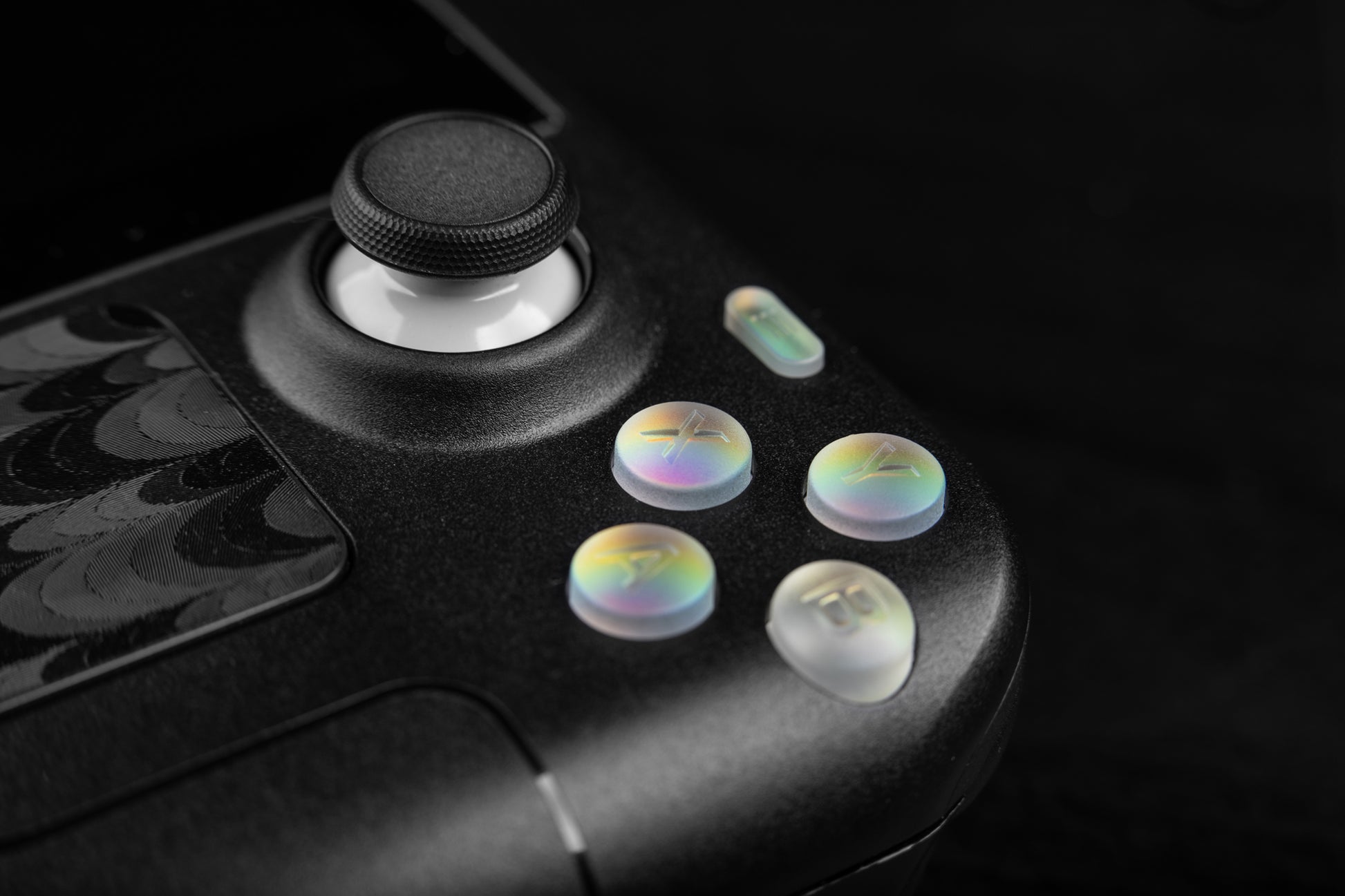 close up of ABXY holographic steam deck button set installed on steam deck. 