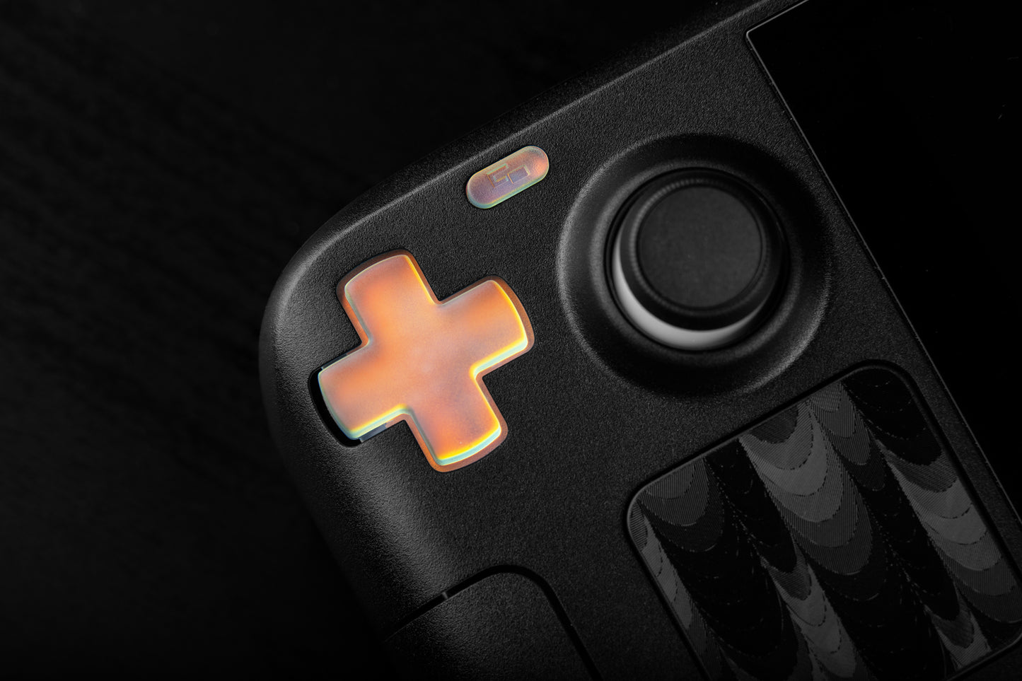 Close up of holographic dpad installed on steam deck. 