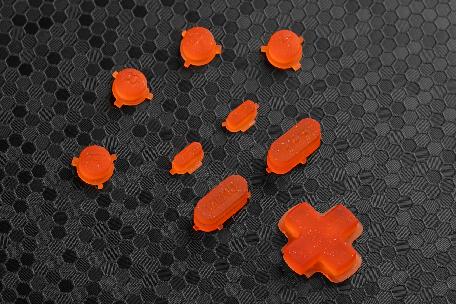 Orange sparkle steam deck button set on a hex background