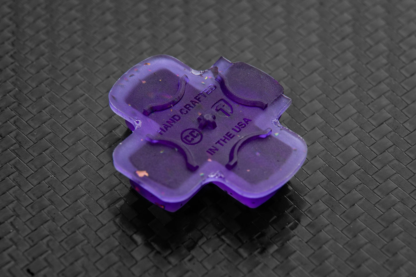 Back side of steam deck dpad transparent purple. Shows made in the usa and logos