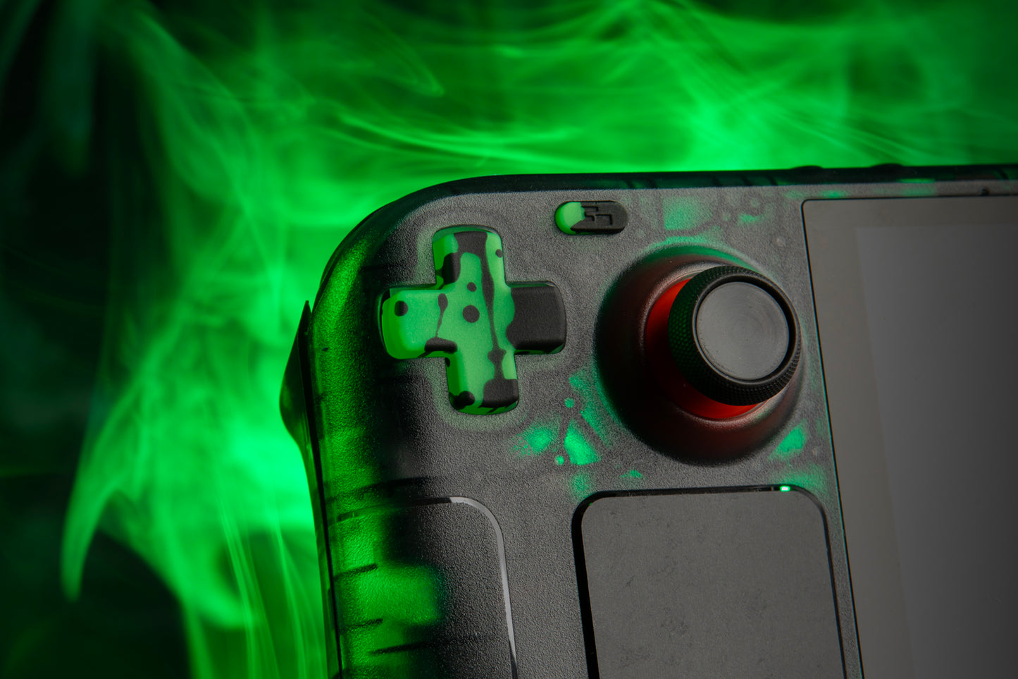 steam deck close up with lime green dpad and foggy green background