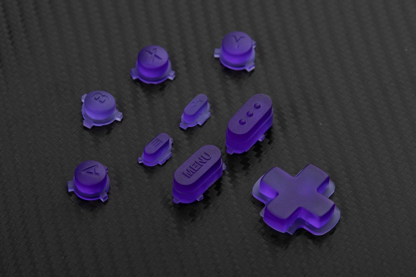 transparent purple steam deck buttons on carbon fiber background