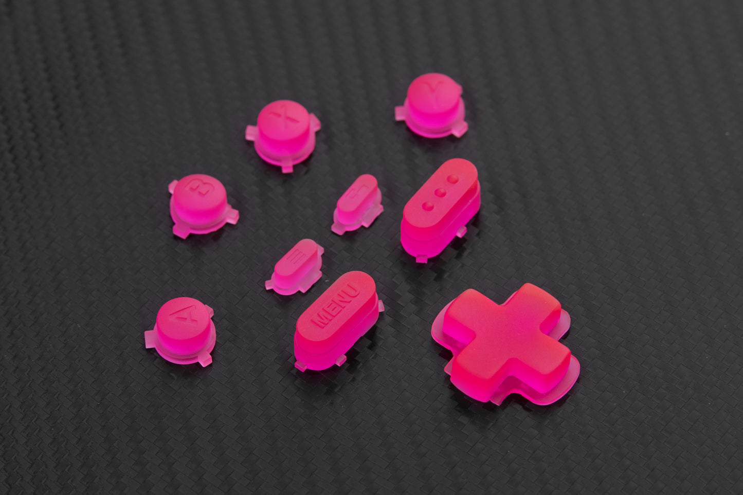 Steam deck butons in bright transparent neon Pink. Carbon fiber background
