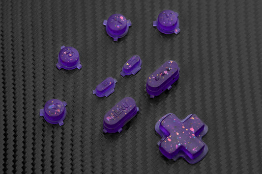 Transparent purple steam deck button set with metallic colored flakes mixed in. 