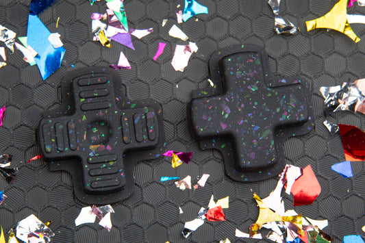 two party black dpads. left DMG gameboy style right standard. 