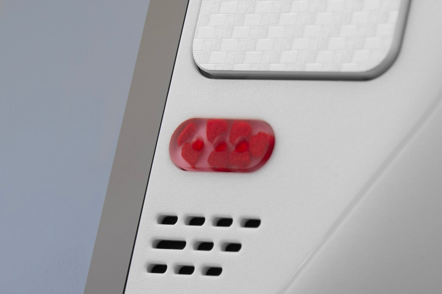 Close-up of menu button installed on steam deck with hearts encapsulated in the button