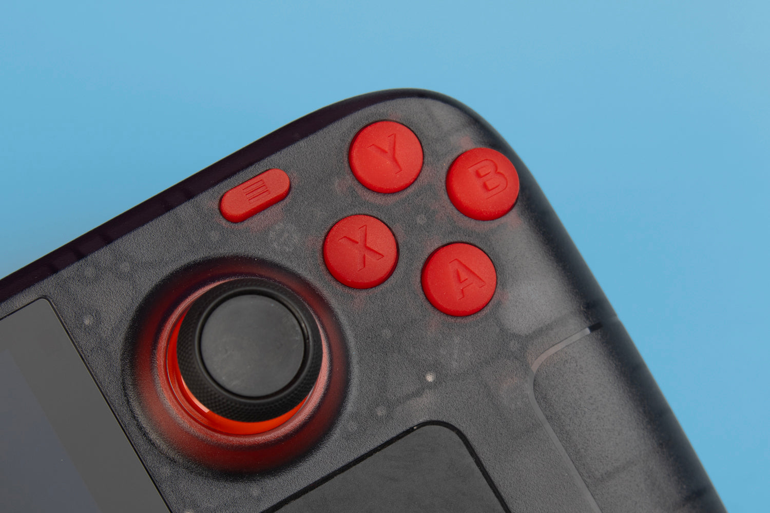 Red ABXY buttons installed on a limited edition steamed deck close-up