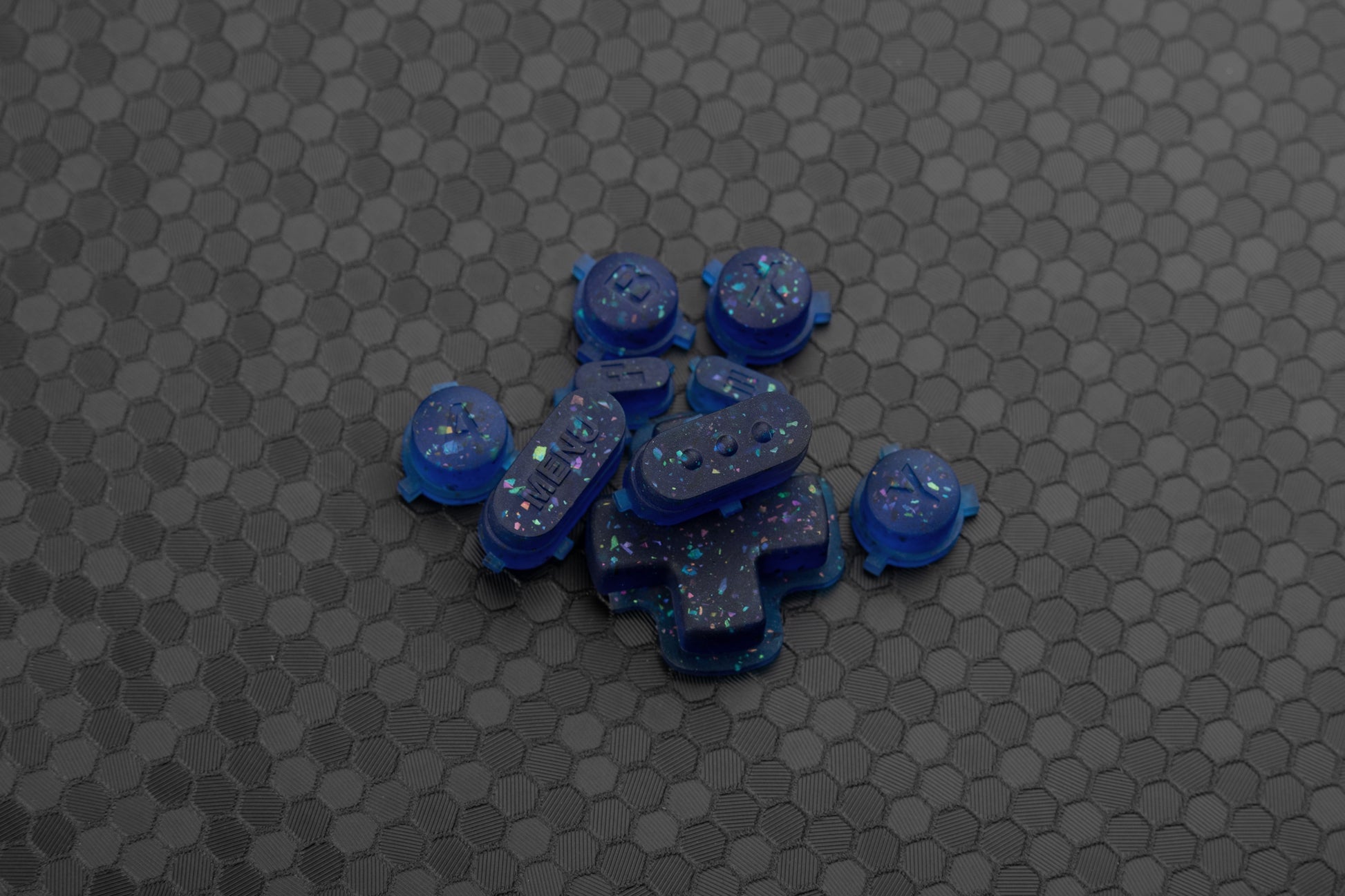 party blue steam deck button set in a pile