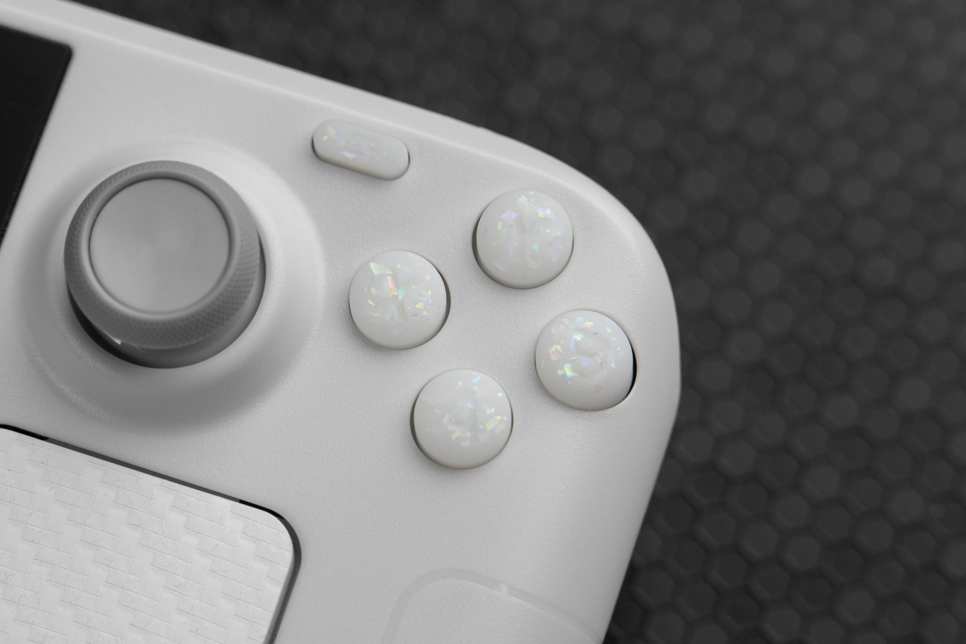 Close up of abxy party white installed on steam deck