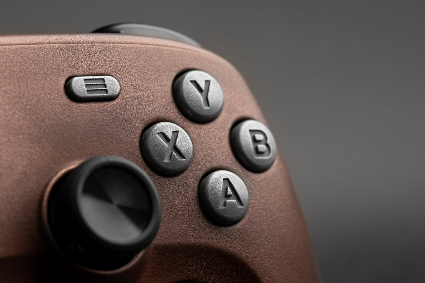 Close up of Steam Controller with aluminum ABXY
