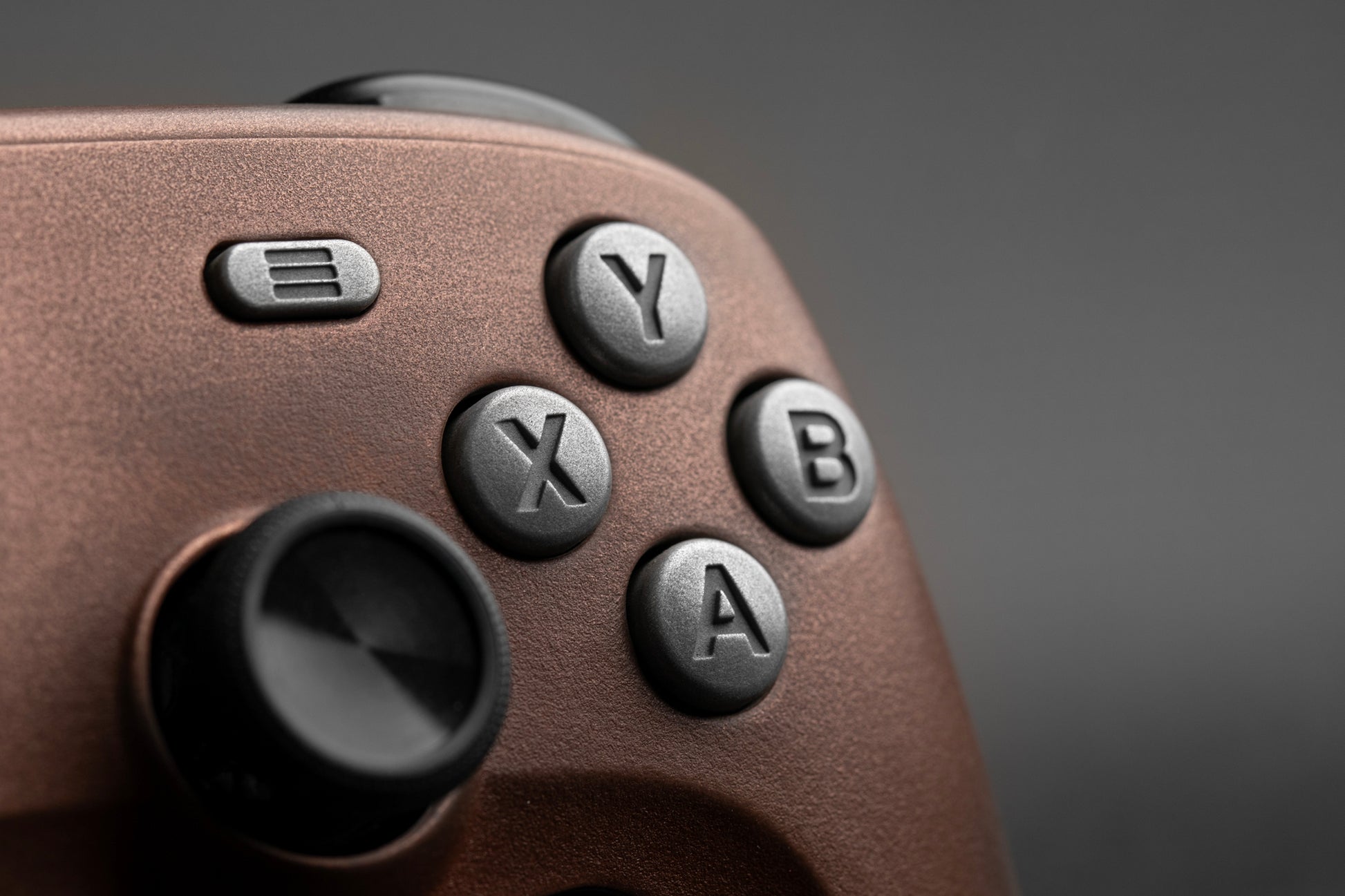 Close up of Steam Controller with aluminum ABXY